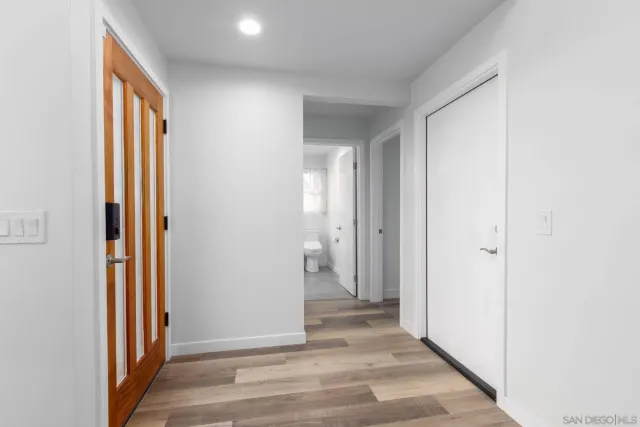 a bedroom with a bed and a shower