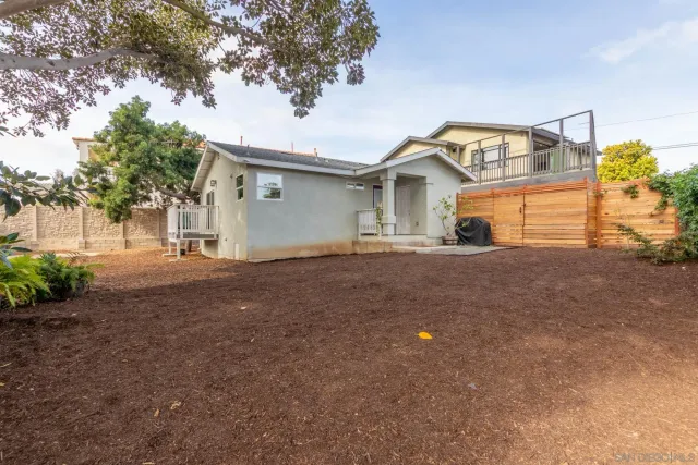 a view of a chair and table in the balcony