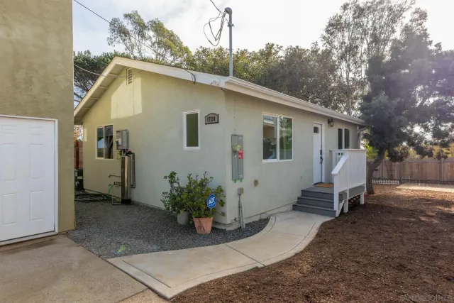 a view of a house with a patio