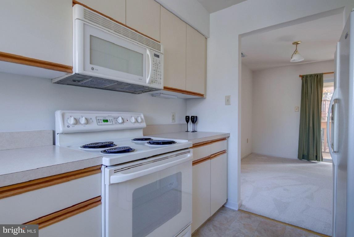 341 Brigade Court Chesterbrook, PA 19087 - Photo 10 of 27 Kitchen open to dining area!