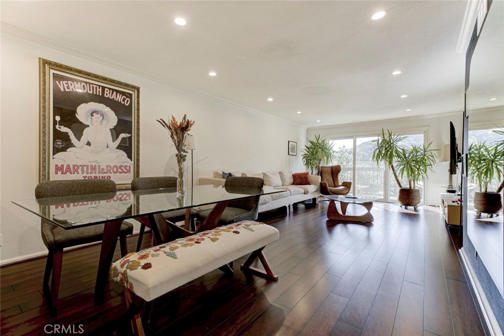 2940 North Verdugo Road, Unit 305 Glendale, CA 91208 - Photo 13 of 26 a living room with furniture and wooden floor