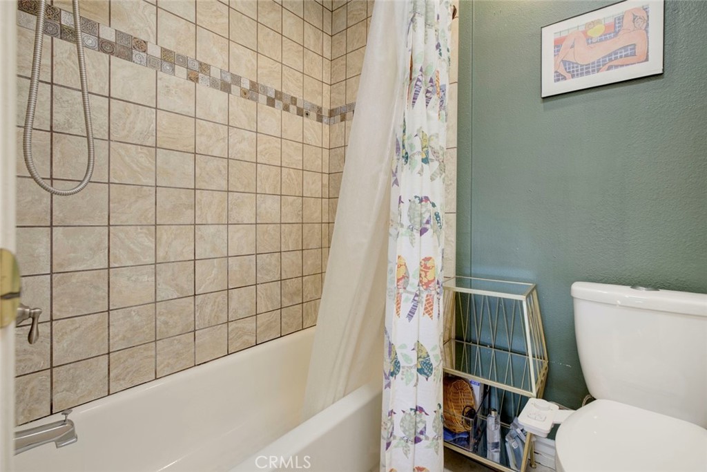 2940 North Verdugo Road, Unit 305 Glendale, CA 91208 - Photo 19 of 26 a bathroom with a toilet and a shower