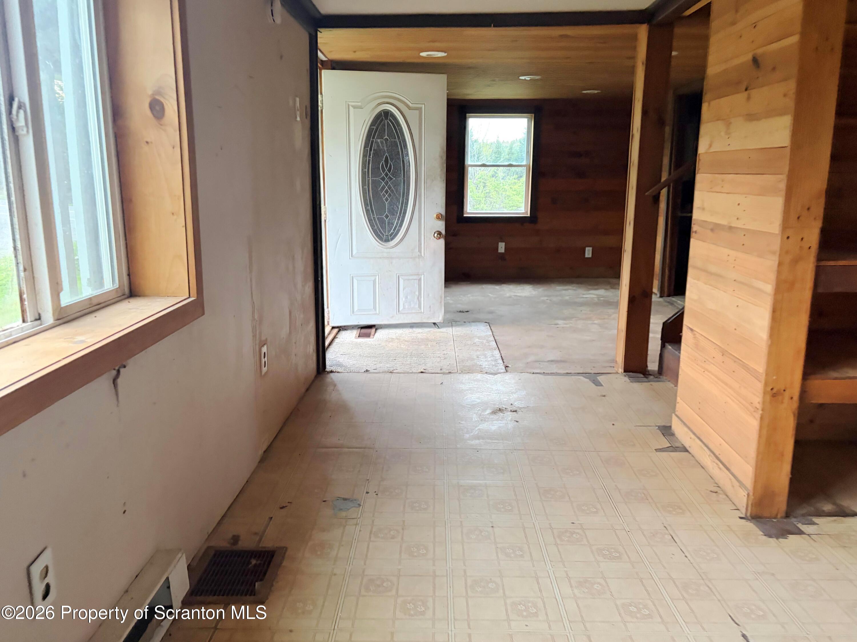 2466 State Rte 4002 Mehoopany, PA 18629 - Photo 3 of 11 a view of a hallway with washer and dryer