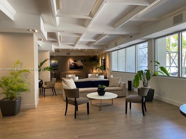 100 Lincoln Road, Unit 616 Miami Beach, FL 33139 - Photo 23 of 31 a living room with furniture and a potted plant