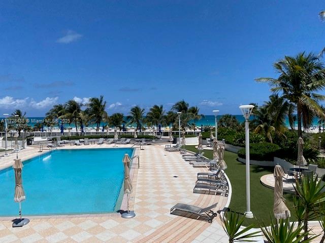 100 Lincoln Road, Unit 616 Miami Beach, FL 33139 - Photo 25 of 31 a view of a swimming pool with outdoor seating