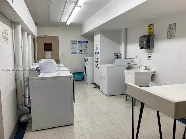 100 Lincoln Road, Unit 616 Miami Beach, FL 33139 - Photo 30 of 31 a room with a couch and a flat screen tv