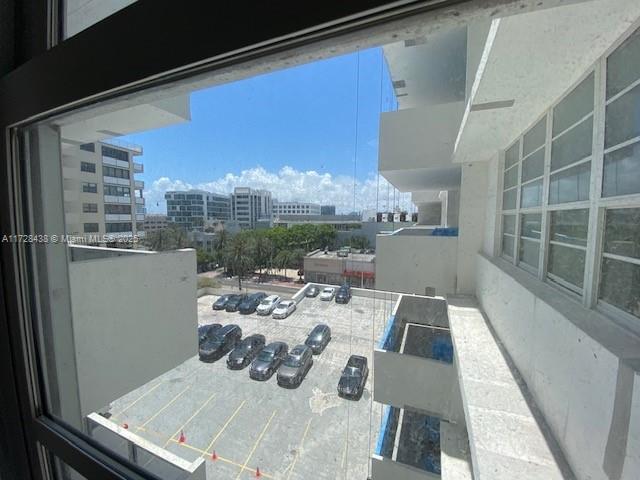100 Lincoln Road, Unit 616 Miami Beach, FL 33139 - Photo 31 of 31 a view of a balcony dining table and chairs