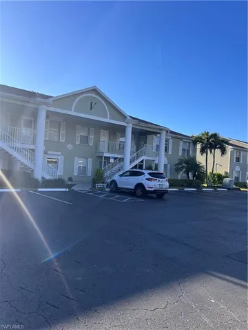 a car parked in front of a house