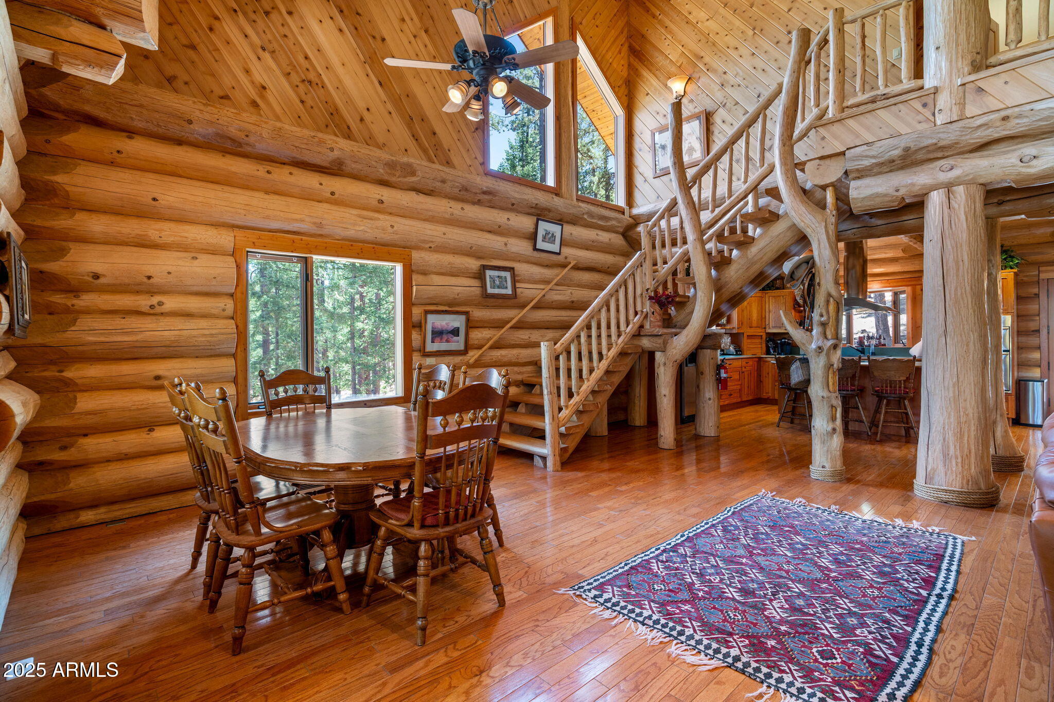 30 N1068 Greer, AZ 85927 - Photo 15 of 50 a dining room with furniture a rug and wooden floor
