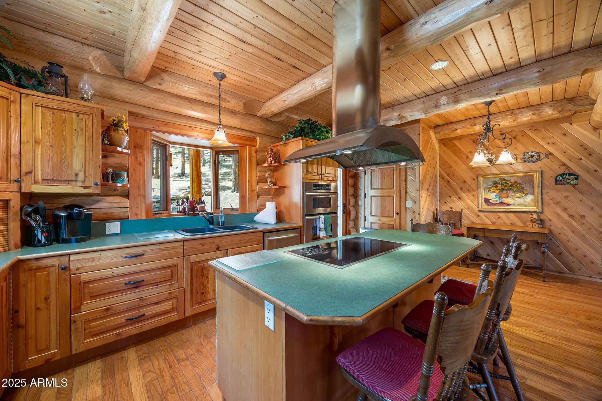 30 N1068 Greer, AZ 85927 - Photo 18 of 50 a view of a dining room with furniture and window