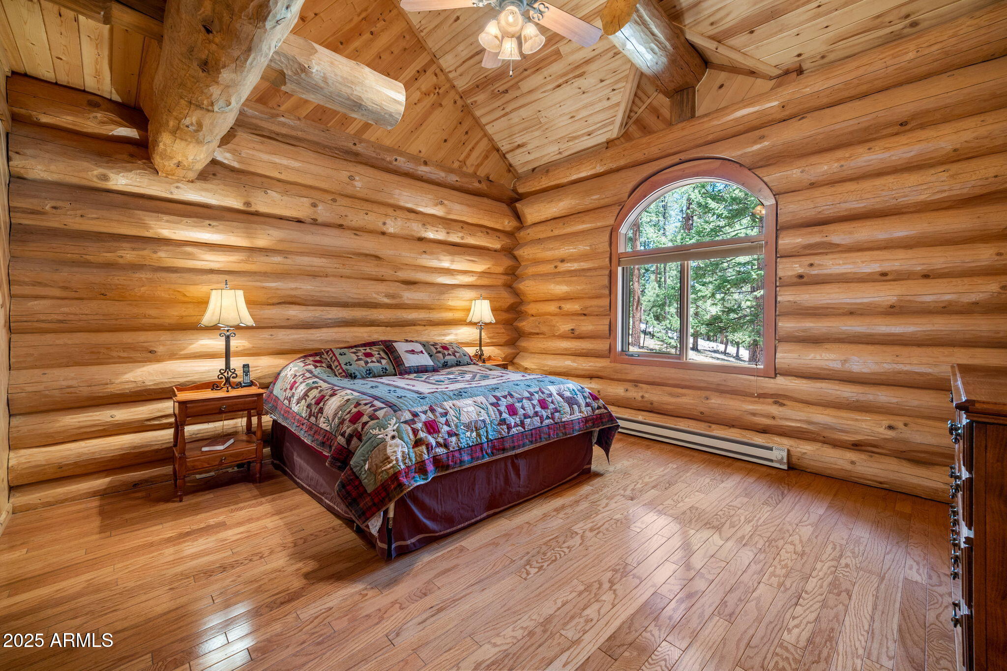 30 N1068 Greer, AZ 85927 - Photo 20 of 50 a bed sitting in a bedroom next to a window