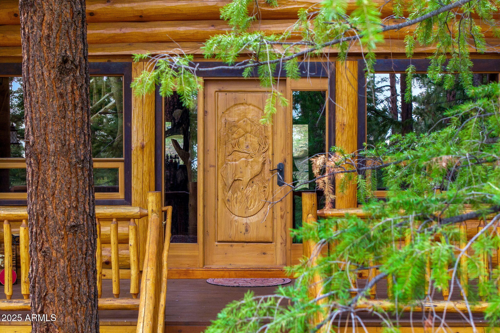 30 N1068 Greer, AZ 85927 - Photo 2 of 50 a front view of a house with a tree