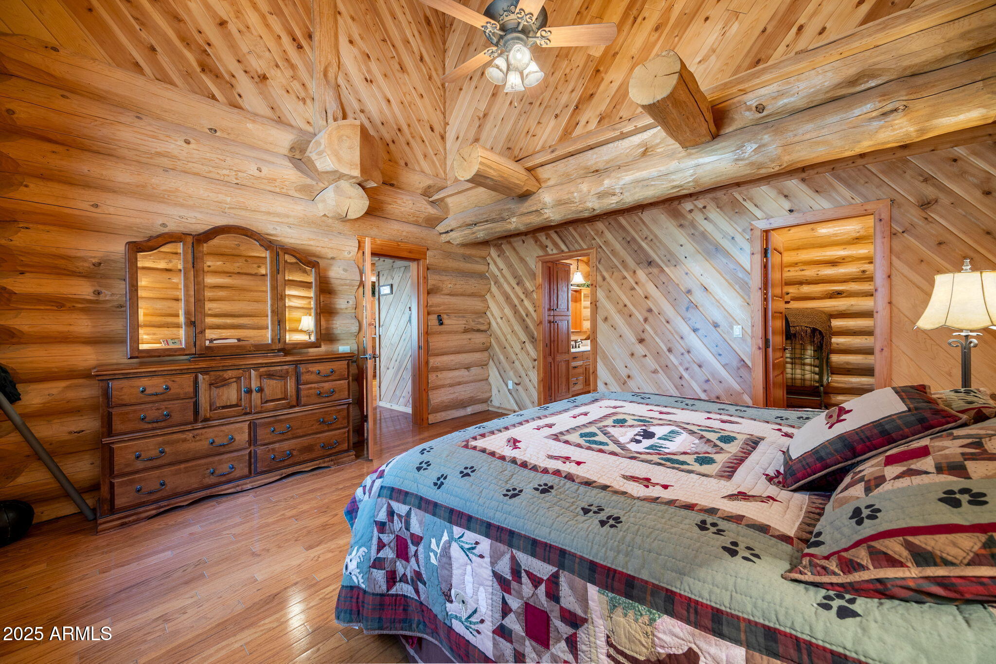 30 N1068 Greer, AZ 85927 - Photo 21 of 50 a bedroom with a bed and wooden floor