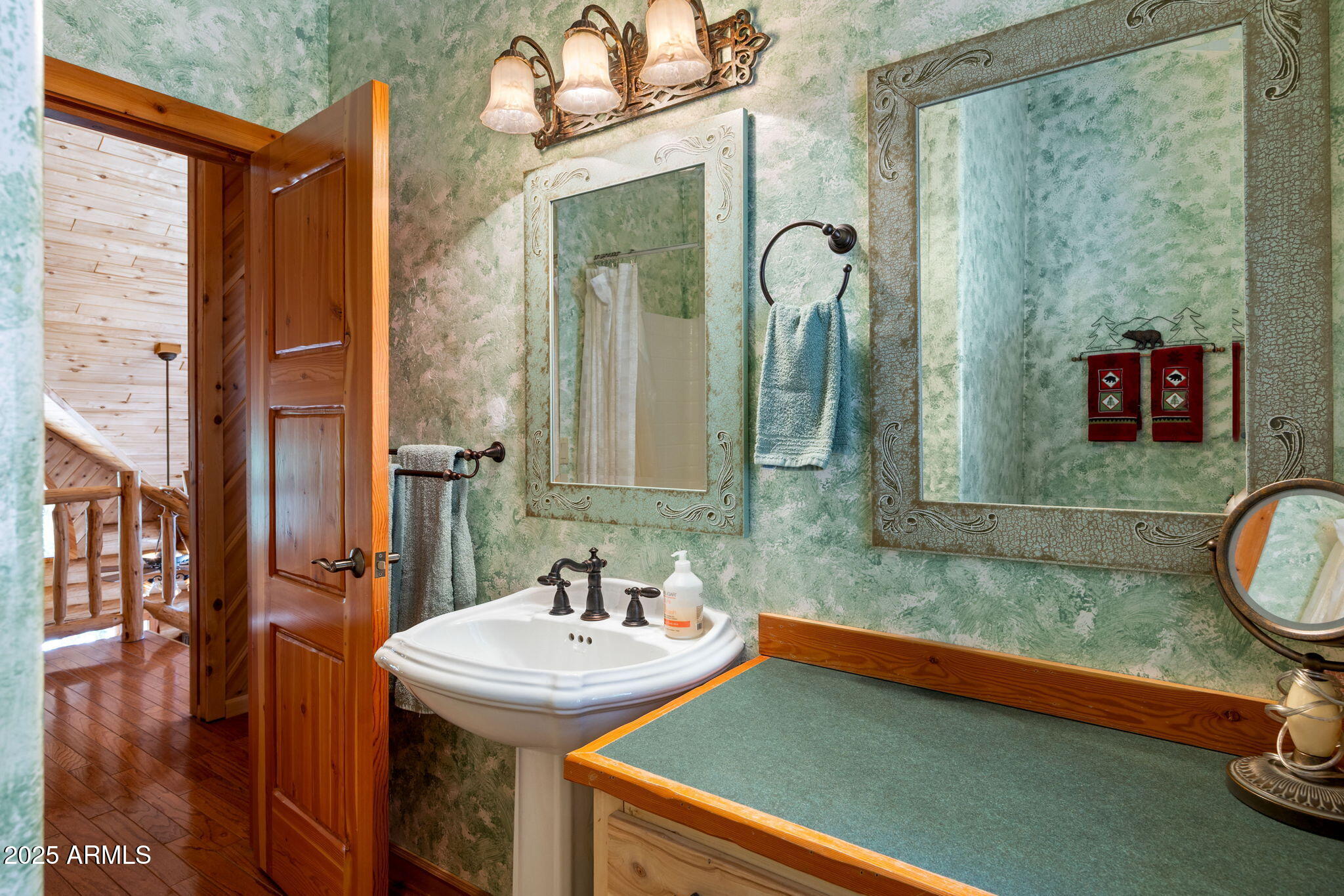 30 N1068 Greer, AZ 85927 - Photo 29 of 50 a bathroom with a sink and a mirror