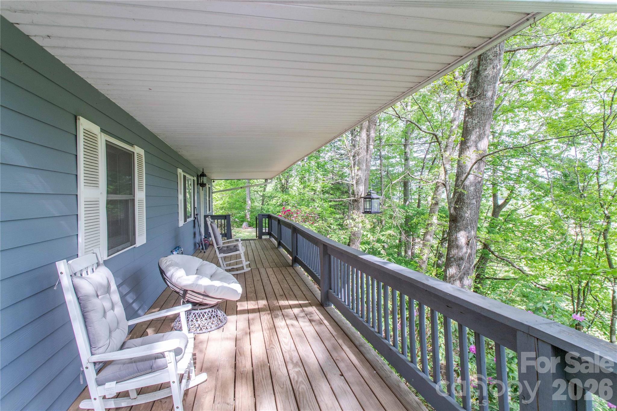 115 Knoll Ridge Waynesville, NC 28785 - Photo 5 of 35 a view of a two chair in the balcony