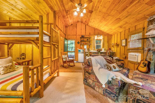 a view of a swimming pool with outdoor seating