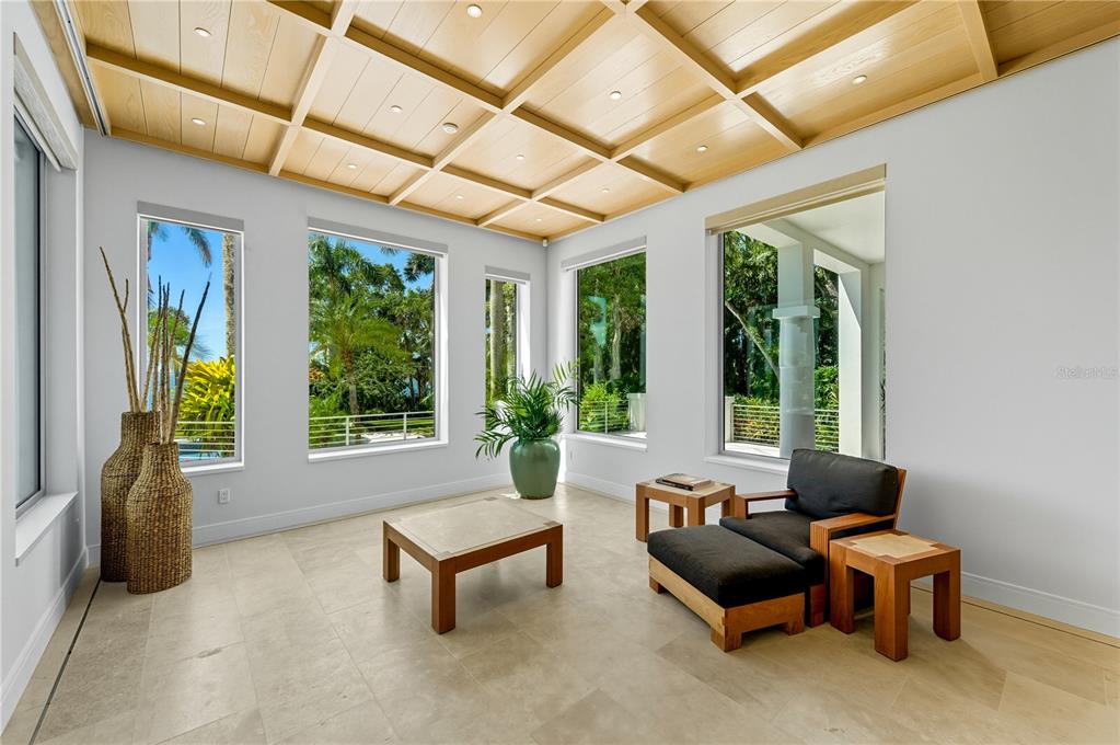 3315 Bay Shore Road Sarasota, FL 34234 - Photo 60 of 96 a living room with furniture and a large window