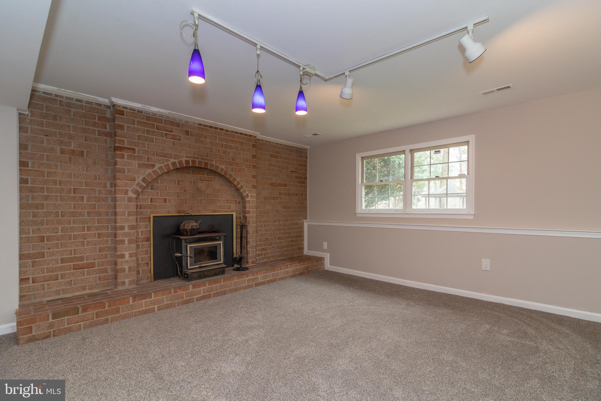 8932 Round Top Road Manassas, VA 20112 - Photo 26 of 39 Huge Family room with Fireplace/woodstove insert