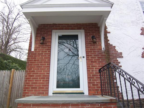 5 Hazelwood Road Worcester, MA 01609 - Photo 3 of 15 a front view of a house with a garden