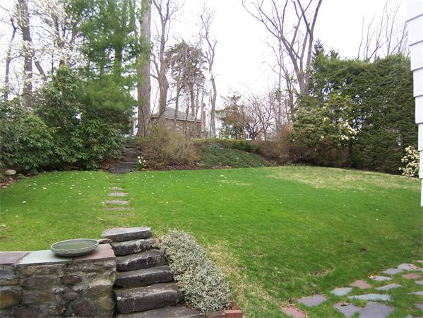 5 Hazelwood Road Worcester, MA 01609 - Photo 5 of 15 a view of a garden with lawn chairs