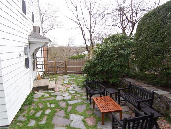 5 Hazelwood Road Worcester, MA 01609 - Photo 7 of 15 a view of a chairs and table in backyard
