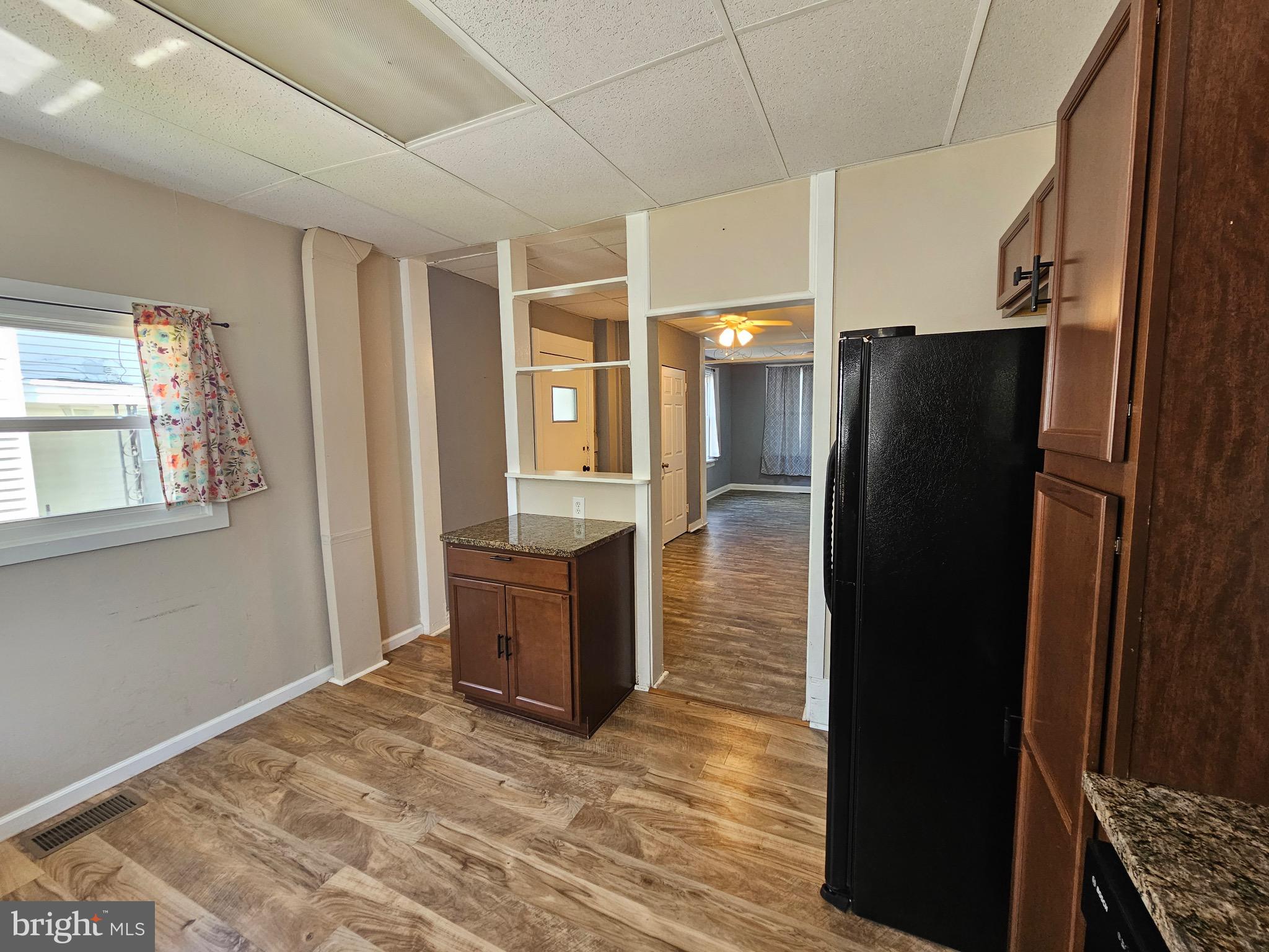 526 Ridge Street Steelton, PA 17113 - Photo 3 of 19 a view of kitchen with refrigerator and cabinet