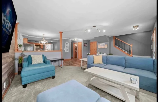 a living room with furniture and a couch