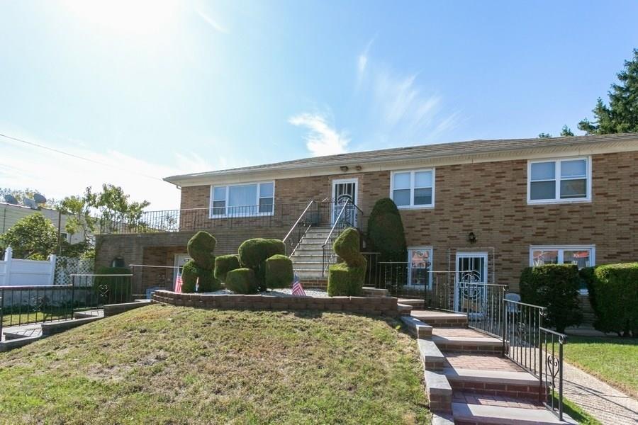 1270 East 98th Street Brooklyn, NY 11236 - Photo 2 of 23 a backyard of a house with yard and outdoor seating