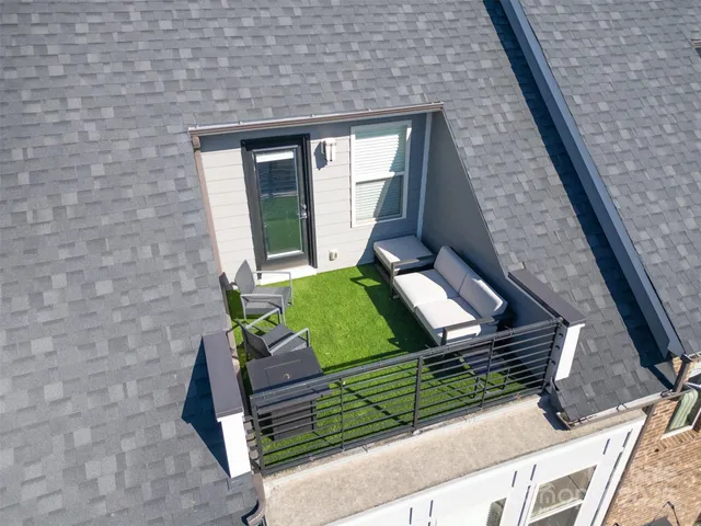 a view of a chairs in a patio