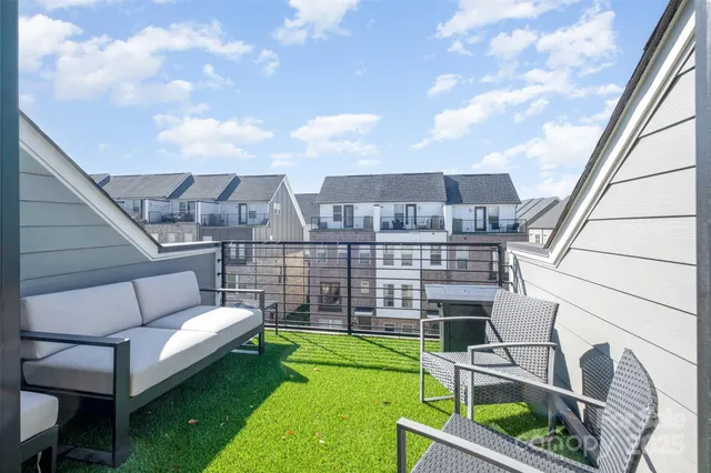 a view of a building with outdoor seating