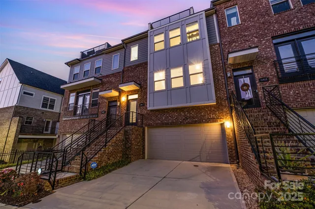 a view of a brick building with a yard