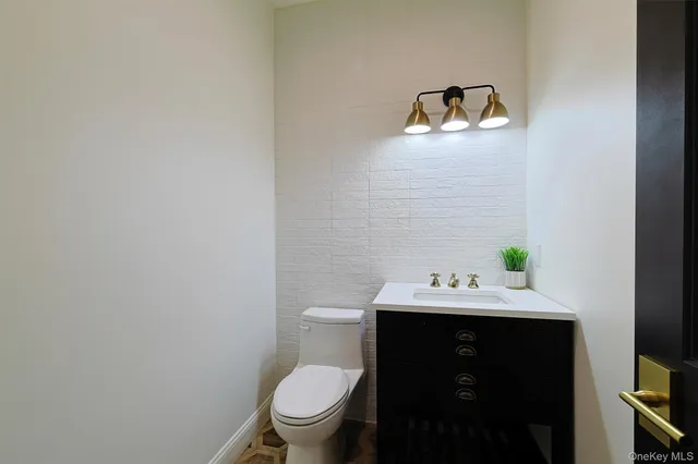 a bathroom with a sink and a toilet