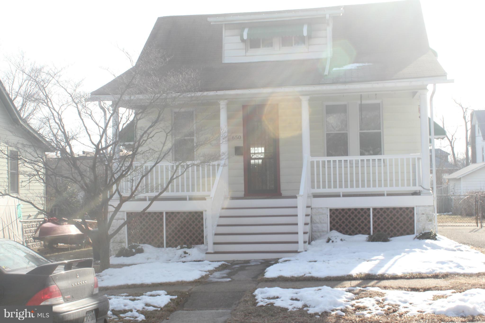 650 North Bend Road Baltimore, MD 21229 - Photo 1 of 22 a view of a house with a yard