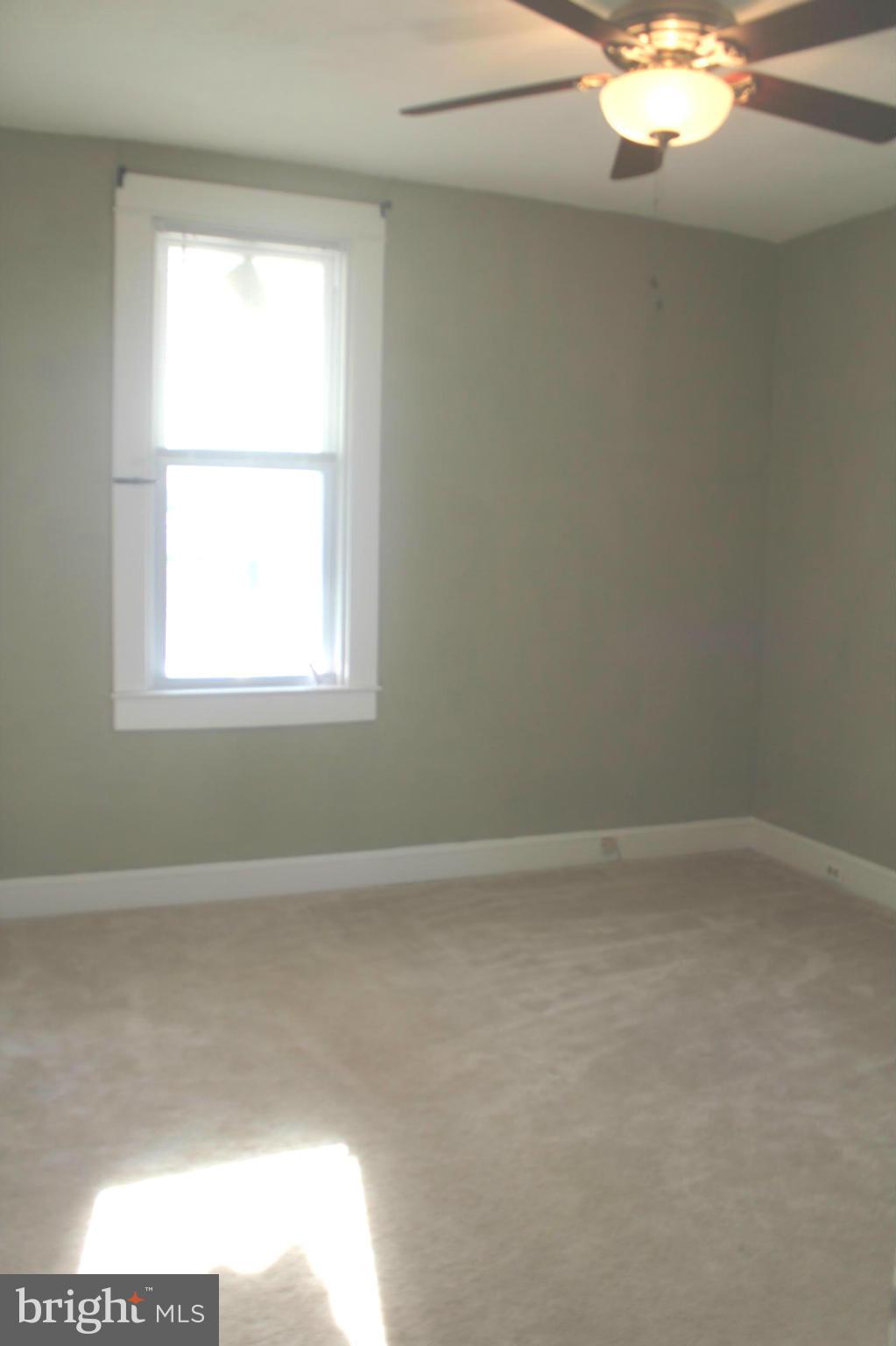 650 North Bend Road Baltimore, MD 21229 - Photo 16 of 22 an empty room with a window