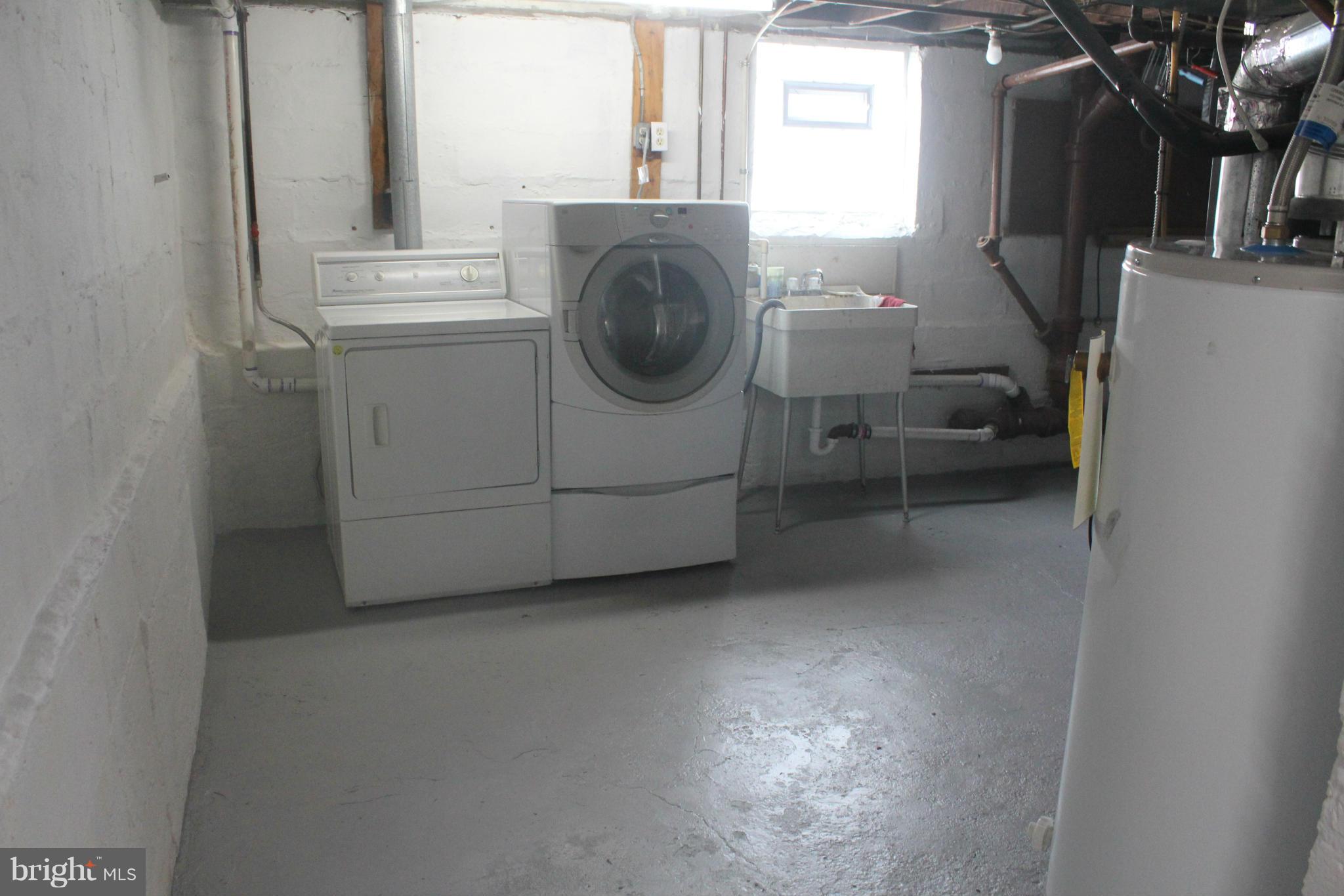 650 North Bend Road Baltimore, MD 21229 - Photo 22 of 22 a utility room with dryer and washer