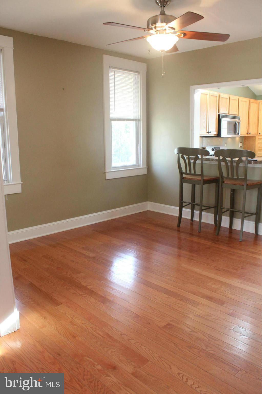 650 North Bend Road Baltimore, MD 21229 - Photo 7 of 22 a view of a dining room with furniture and chandelier