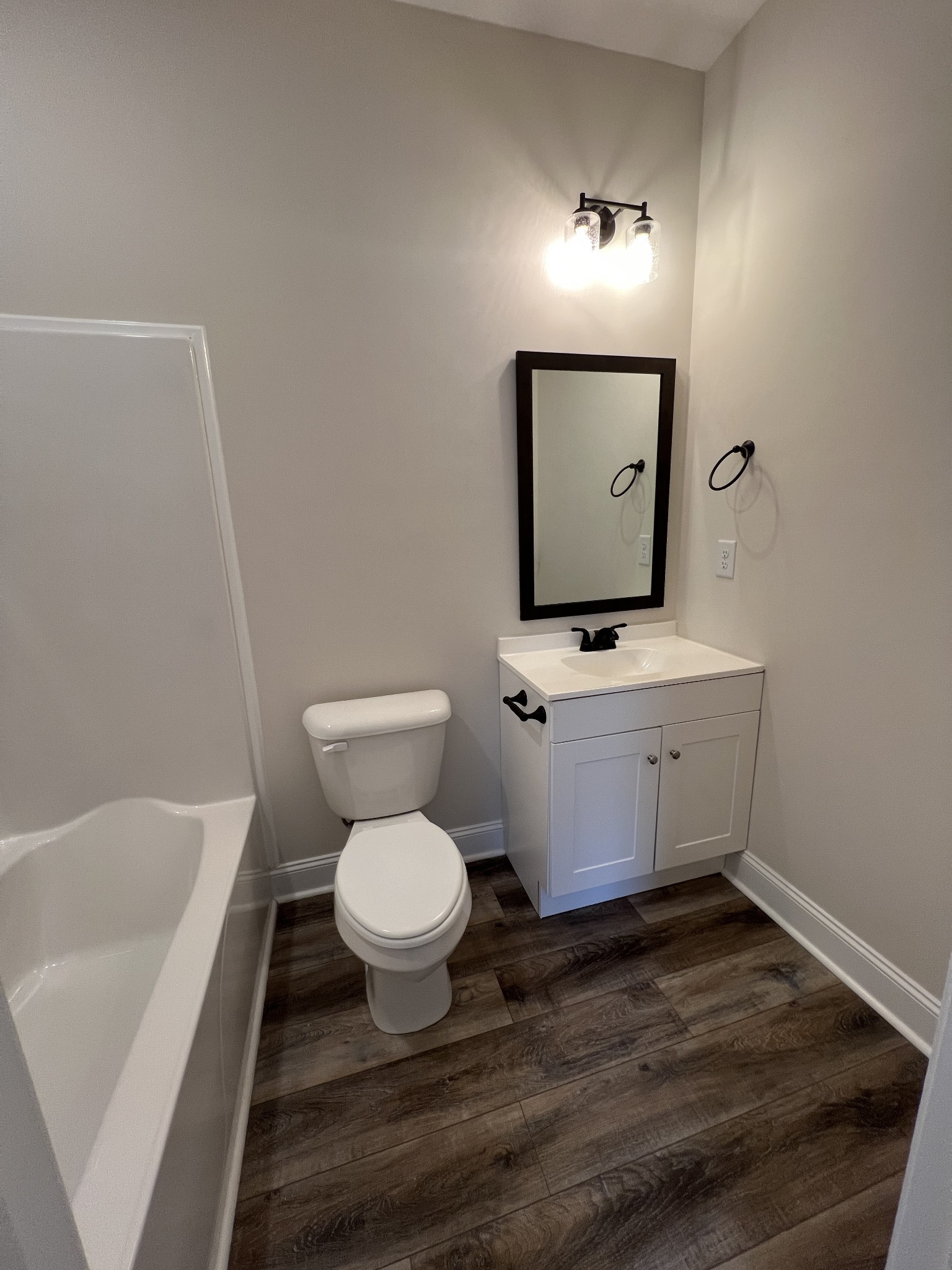 550 Peachers Mill Road, Unit B4 Clarksville, TN 37042 - Photo 20 of 34 a bathroom with a toilet sink and mirror