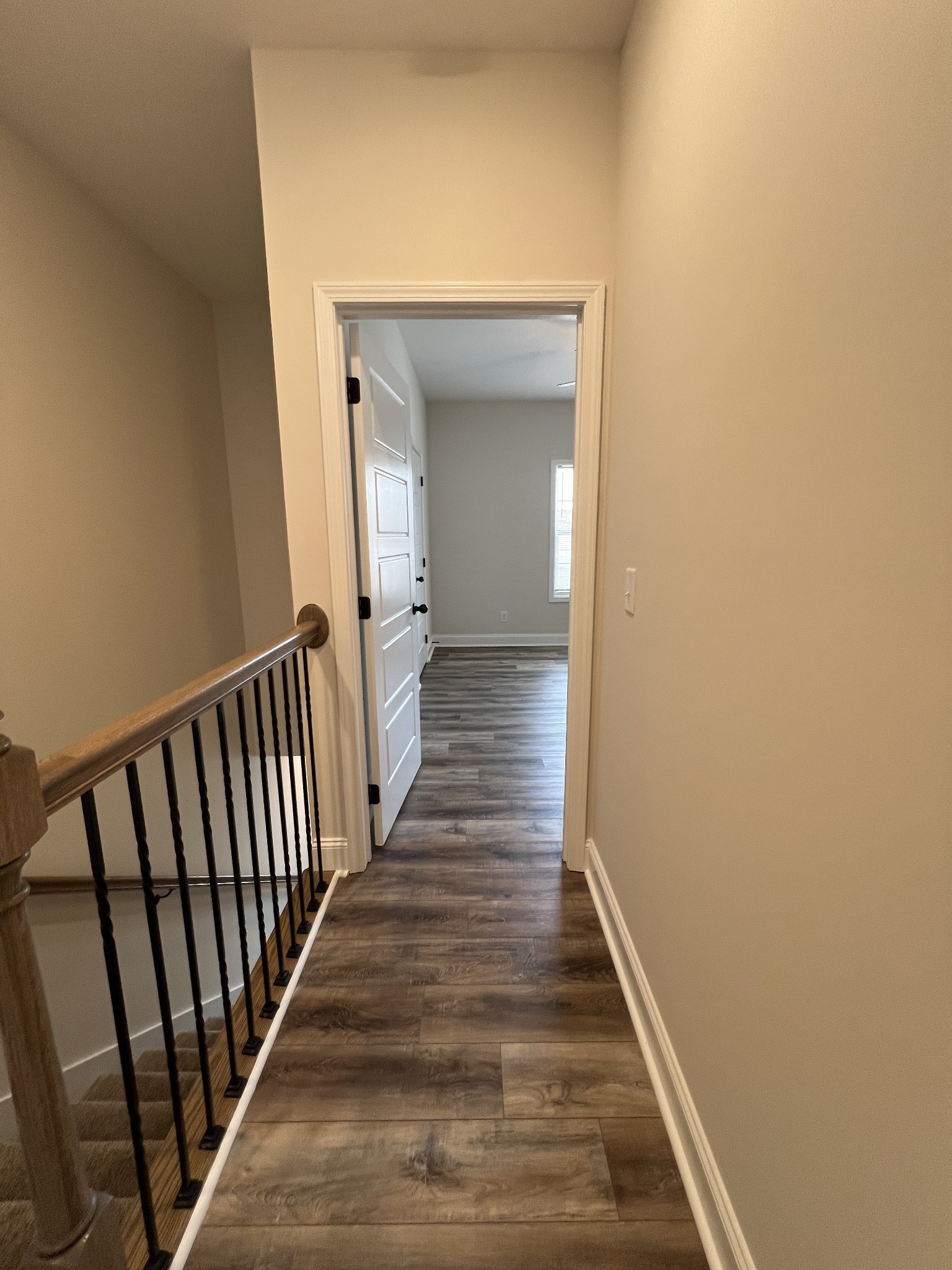 550 Peachers Mill Road, Unit B4 Clarksville, TN 37042 - Photo 22 of 34 a view of a hallway with wooden floor and staircase