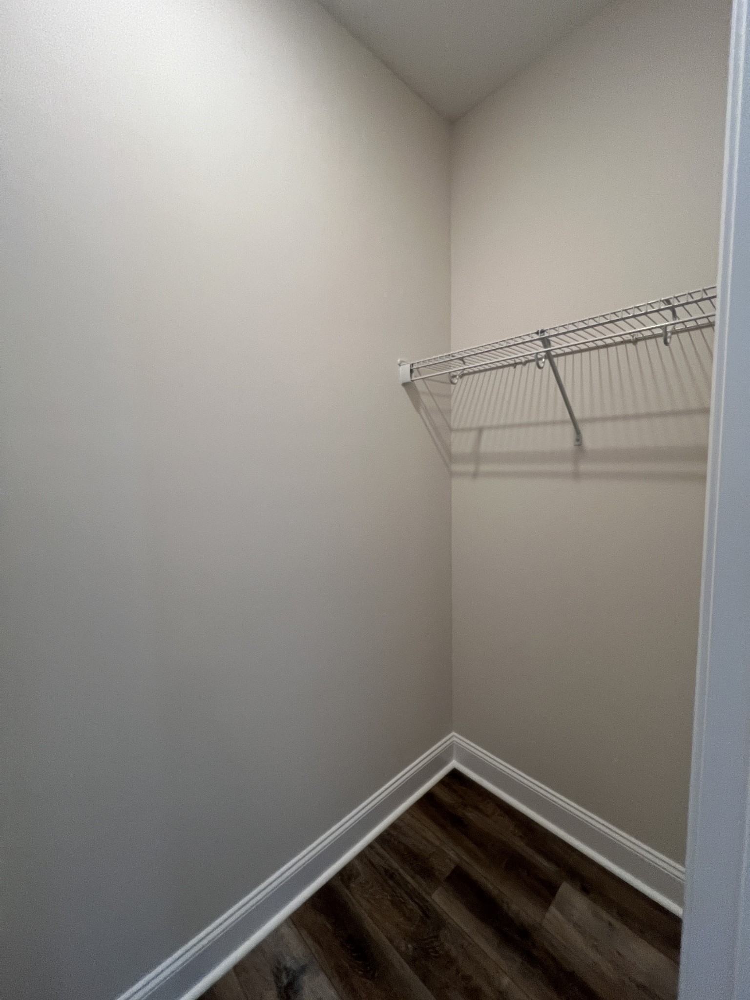 550 Peachers Mill Road, Unit B4 Clarksville, TN 37042 - Photo 26 of 34 a view of a room with racks on the wall