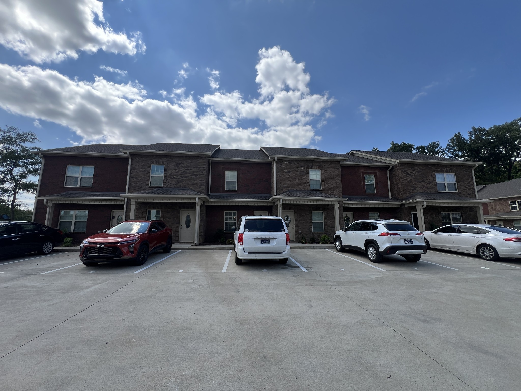 550 Peachers Mill Road, Unit B4 Clarksville, TN 37042 - Photo 32 of 34 a view of street with parked cars