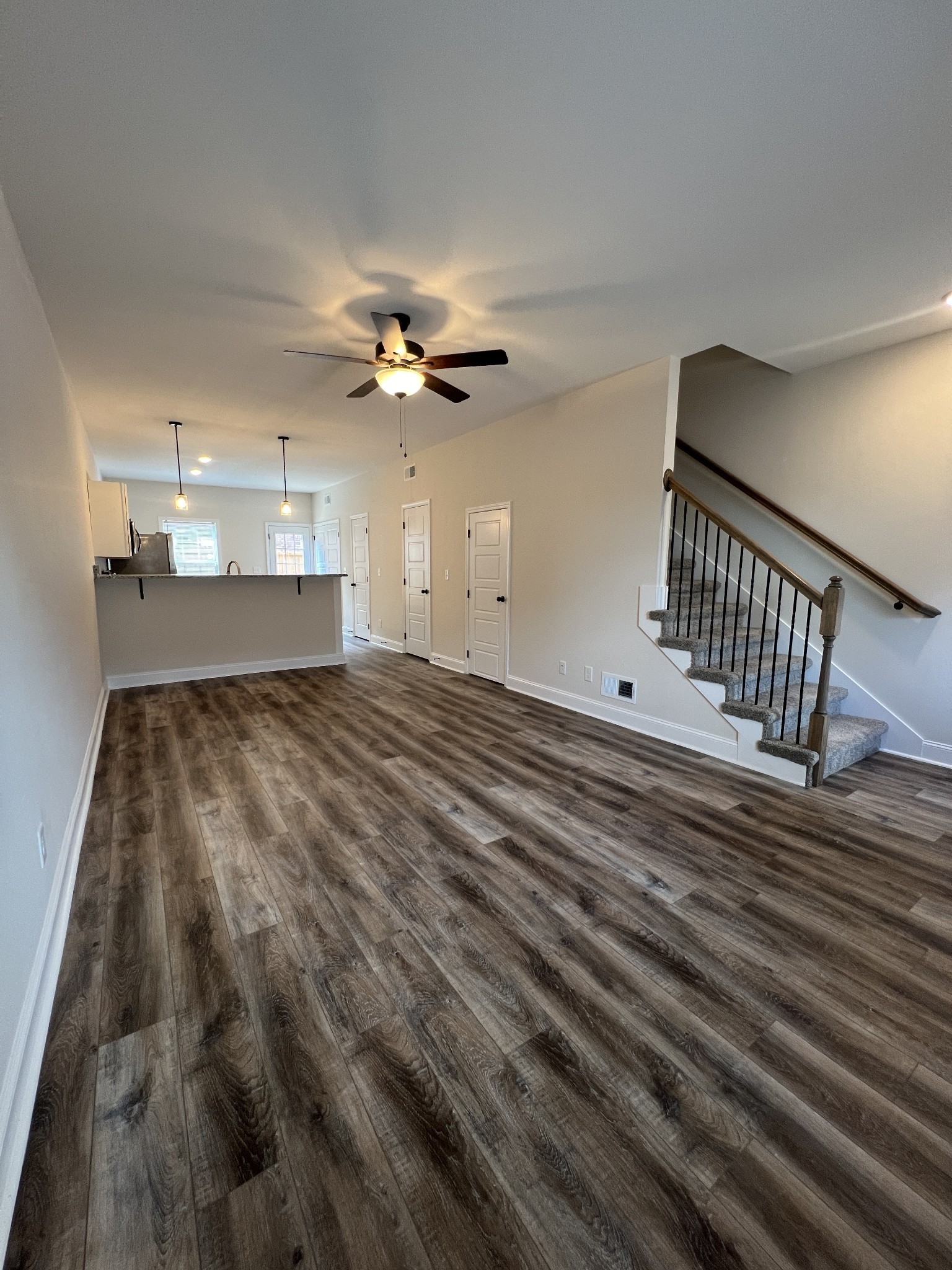 550 Peachers Mill Road, Unit B4 Clarksville, TN 37042 - Photo 4 of 34 wooden floor in an empty room with a window