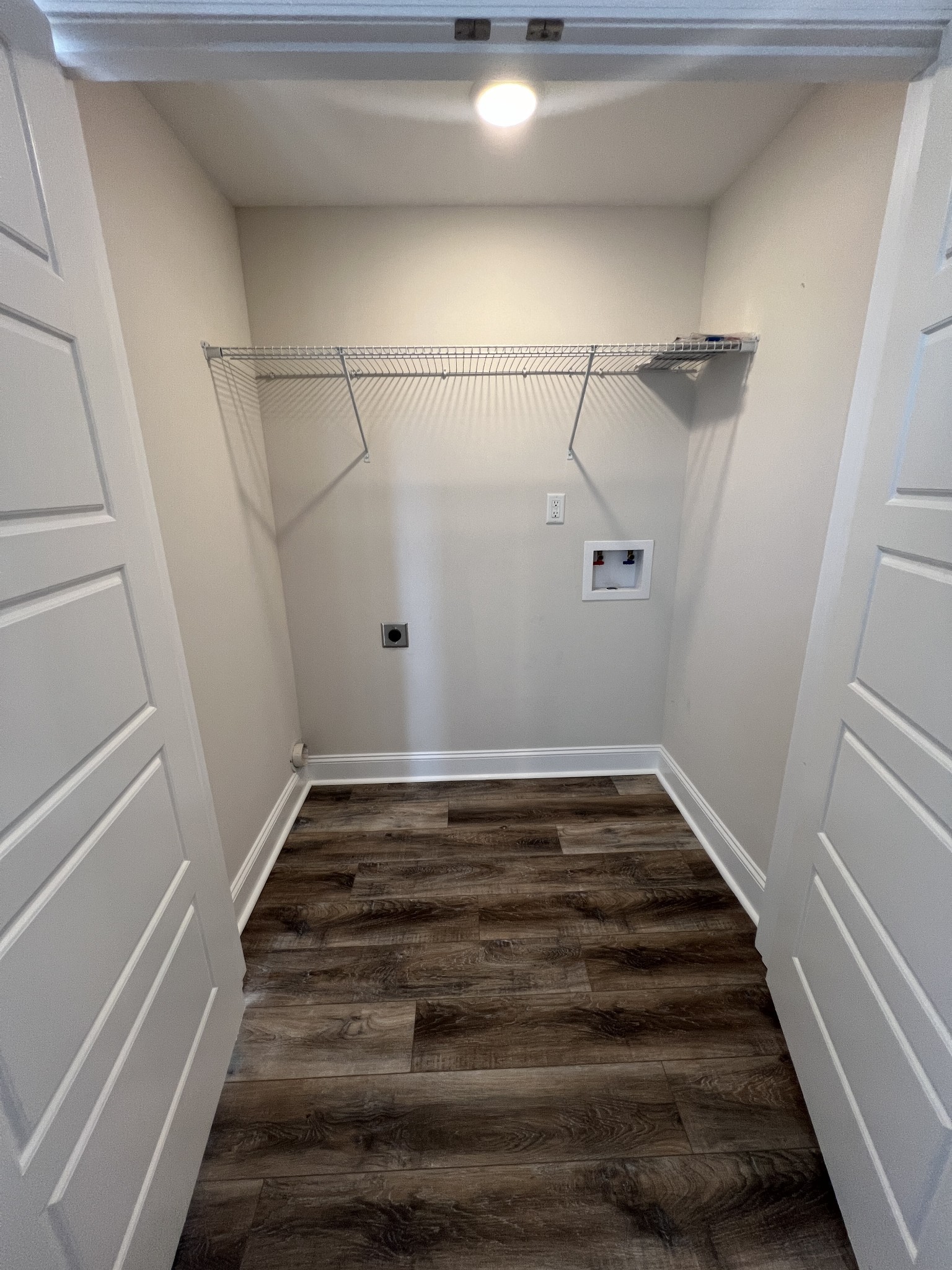 550 Peachers Mill Road, Unit B4 Clarksville, TN 37042 - Photo 8 of 34 a view of a room with racks on the wall
