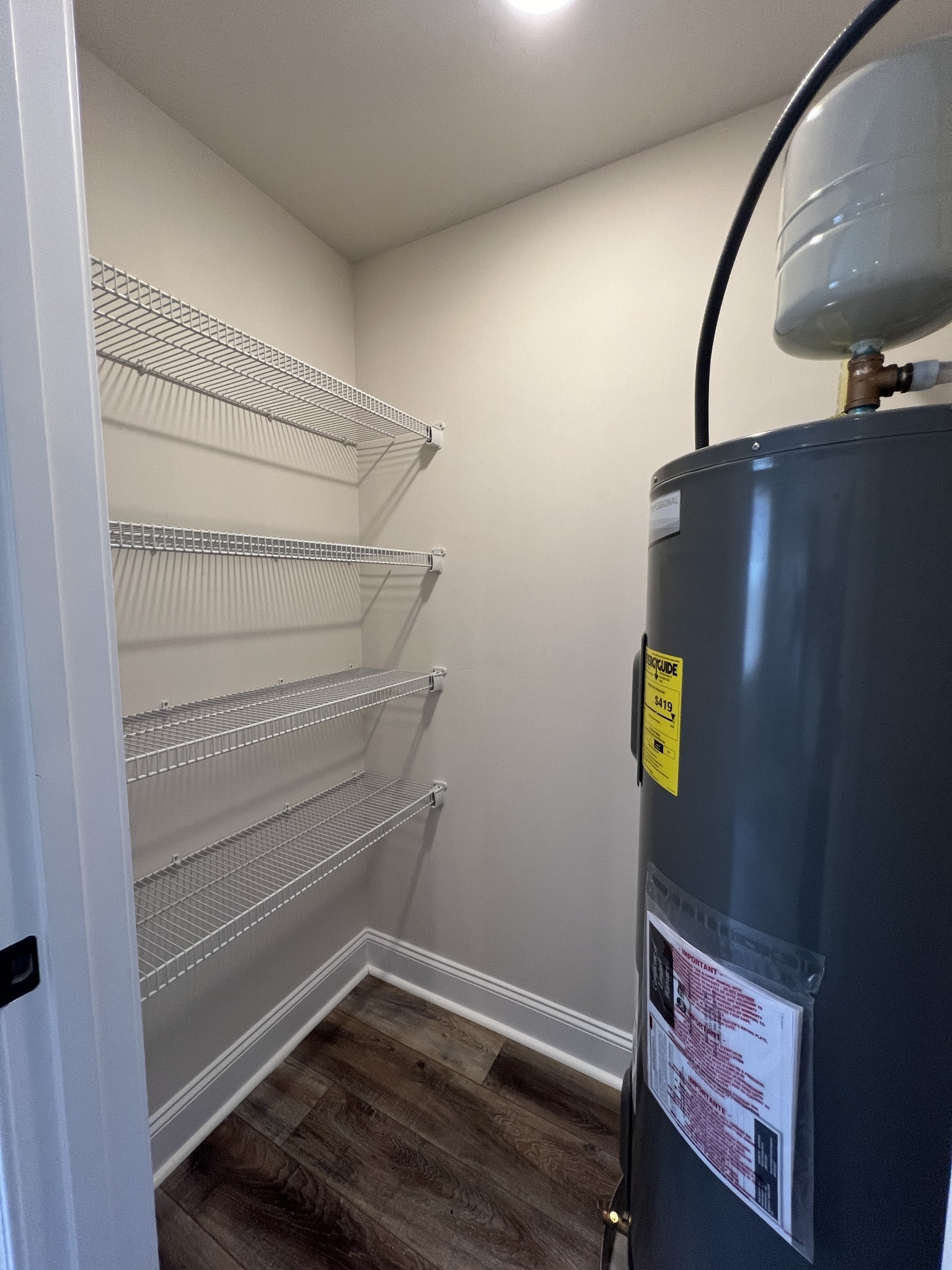 550 Peachers Mill Road, Unit B4 Clarksville, TN 37042 - Photo 9 of 34 a view of storage and utility room with empty racks