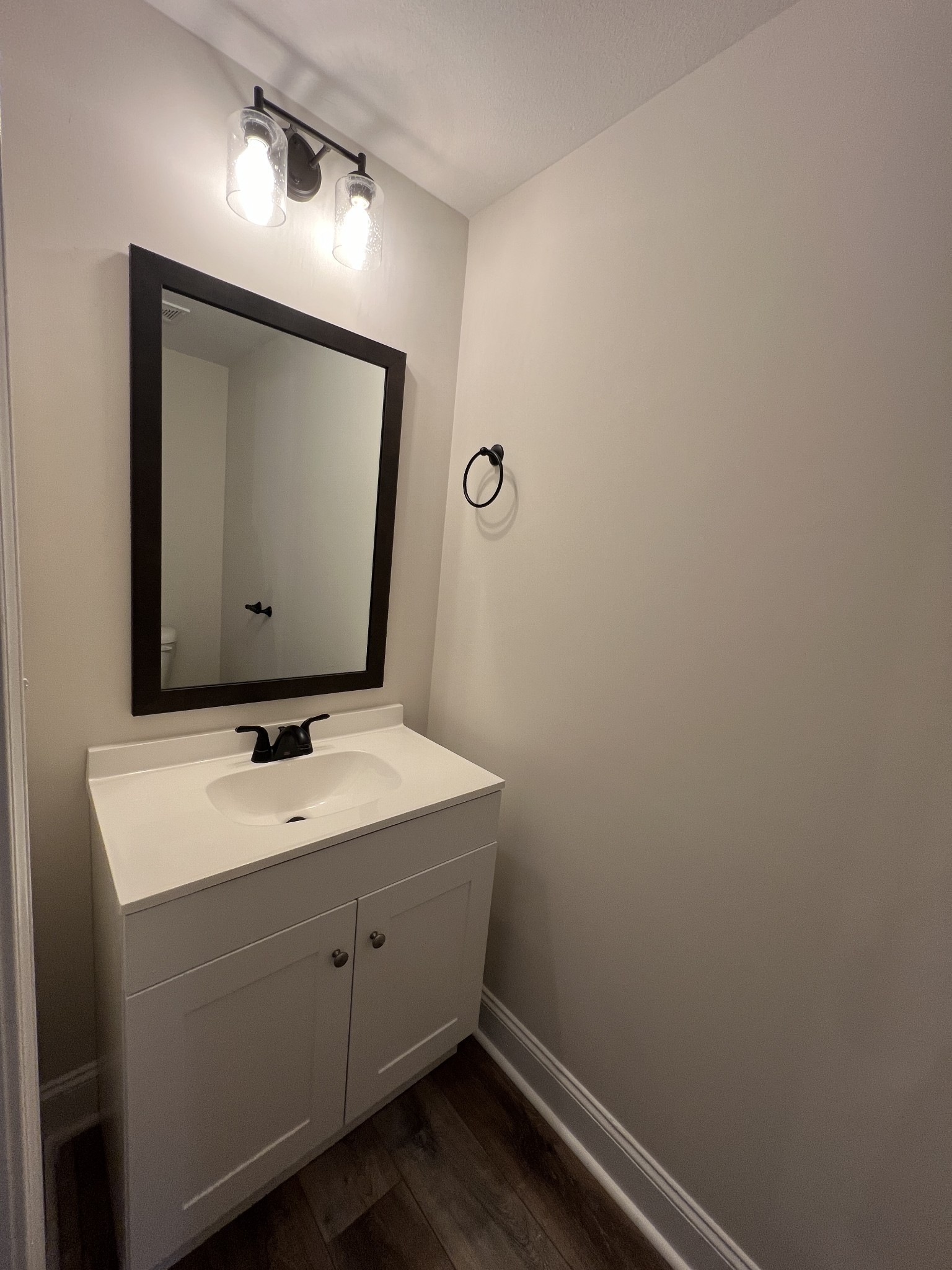 550 Peachers Mill Road, Unit B4 Clarksville, TN 37042 - Photo 10 of 34 a bathroom with a toilet sink and mirror