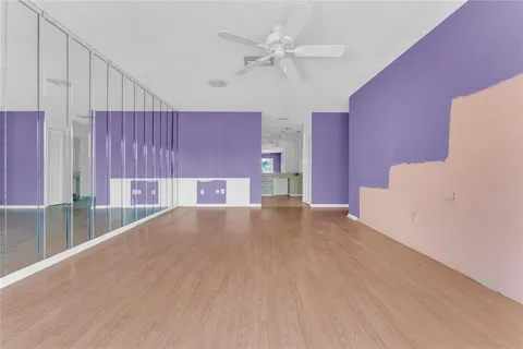 a view of a livingroom with a ceiling fan