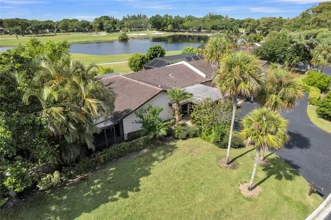a view of a lake with a yard