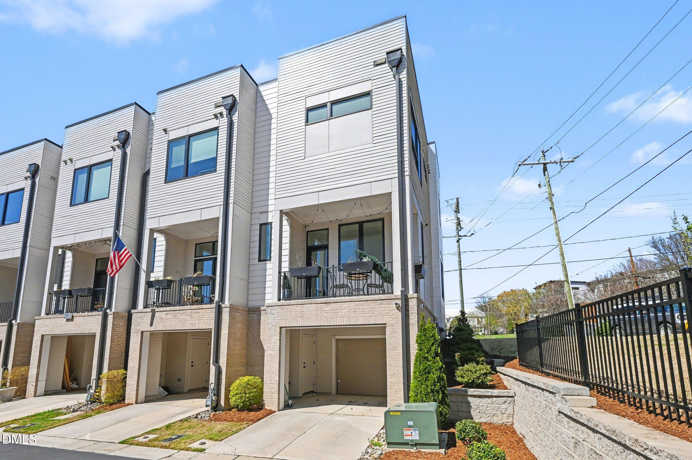 528 North Roxboro Street Durham, NC 27701 - Photo 25 of 26 a view of a building with a door and windows