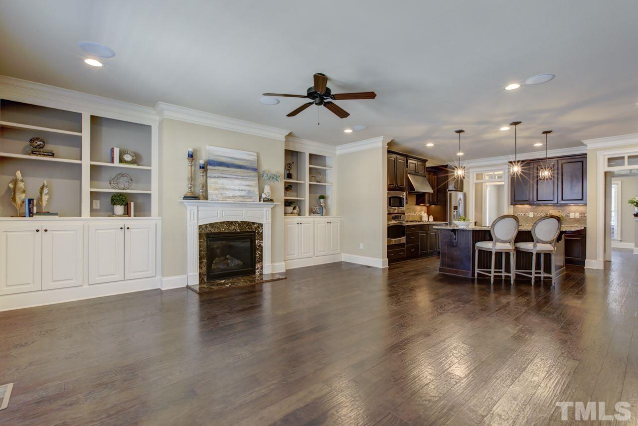 226 Penley Circle Raleigh, NC 27609 - Photo 4 of 14 a view of a livingroom with furniture and a fireplace
