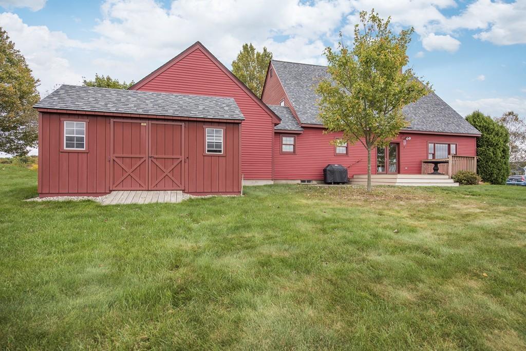 101 Plain Road Deerfield, MA 01373 - Photo 6 of 33 a front view of a house with a garden and yard