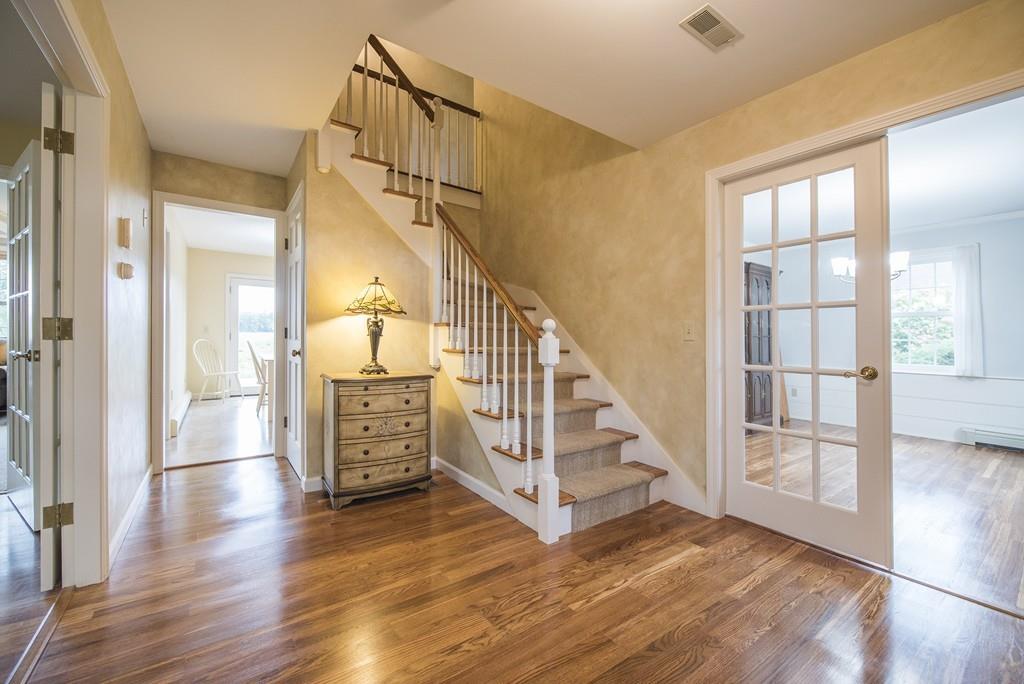 101 Plain Road Deerfield, MA 01373 - Photo 8 of 33 a view of entryway with wooden floor and stairs